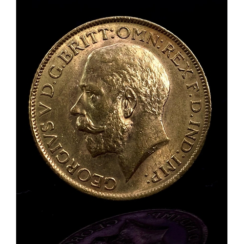 64 - A 1913 George V 22K Gold Full Sovereign.