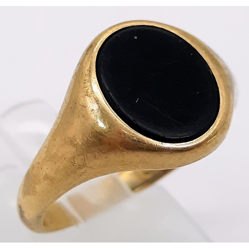 66 - A Vintage 9k Yellow Gold Black Onyx Signet Ring. Size S. 5.6g total weight.