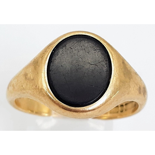 66 - A Vintage 9k Yellow Gold Black Onyx Signet Ring. Size S. 5.6g total weight.