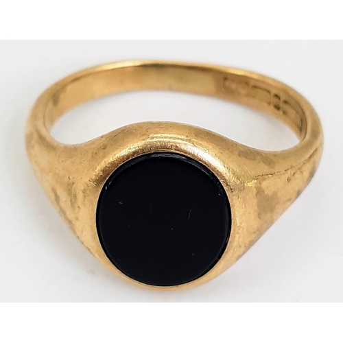 66 - A Vintage 9k Yellow Gold Black Onyx Signet Ring. Size S. 5.6g total weight.