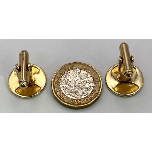 68 - A Pair of 9K Yellow Gold Commemorative Cufflinks - 10 Years of Freedom. 12.9g total weight