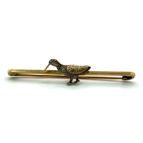 398 - A Vintage 9K Gold Bar Brooch with Bird Decoration. 5cm length. 2.6g total weight.