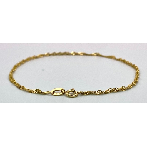 486 - A 9K Yellow Gold Delicate Twist Bracelet. 18cm. 0.80g weight.