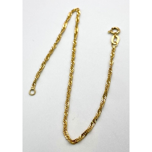 486 - A 9K Yellow Gold Delicate Twist Bracelet. 18cm. 0.80g weight.