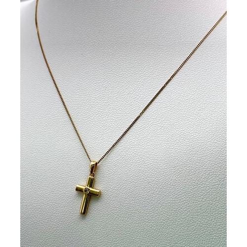 919 - A 9K Yellow Gold and Diamond Cross Pendant on a 9K Yellow Gold Necklace. 2cm and 44cm. 1.5g total we... 