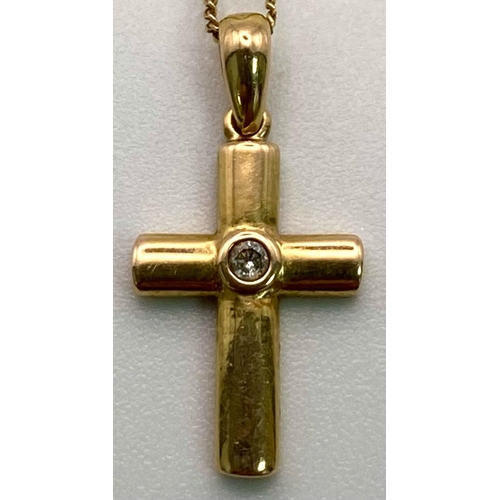 919 - A 9K Yellow Gold and Diamond Cross Pendant on a 9K Yellow Gold Necklace. 2cm and 44cm. 1.5g total we... 