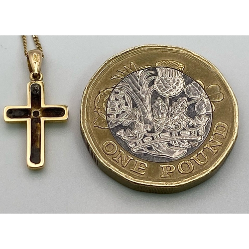 919 - A 9K Yellow Gold and Diamond Cross Pendant on a 9K Yellow Gold Necklace. 2cm and 44cm. 1.5g total we... 