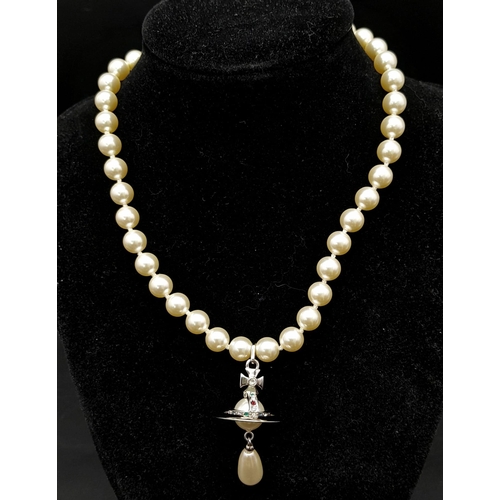 855 - A Vivienne Westwood Cultured Pearl Necklace with Drop Pendant. 38cm length. Comes with original VW p... 