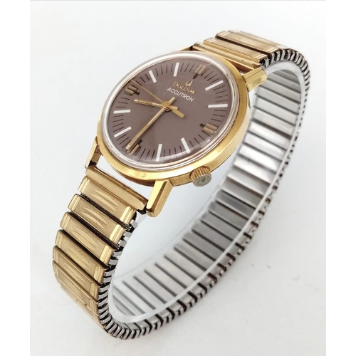 488 - A Vintage Bulova Accutron Gents Watch. Gilded expandable strap. Two tone stainless steel case - 34mm... 