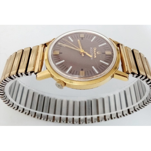 488 - A Vintage Bulova Accutron Gents Watch. Gilded expandable strap. Two tone stainless steel case - 34mm... 