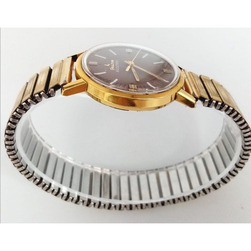 488 - A Vintage Bulova Accutron Gents Watch. Gilded expandable strap. Two tone stainless steel case - 34mm... 