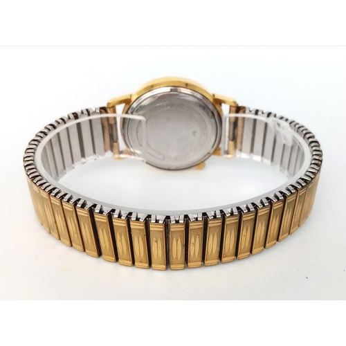 488 - A Vintage Bulova Accutron Gents Watch. Gilded expandable strap. Two tone stainless steel case - 34mm... 