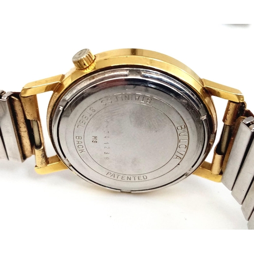 488 - A Vintage Bulova Accutron Gents Watch. Gilded expandable strap. Two tone stainless steel case - 34mm... 