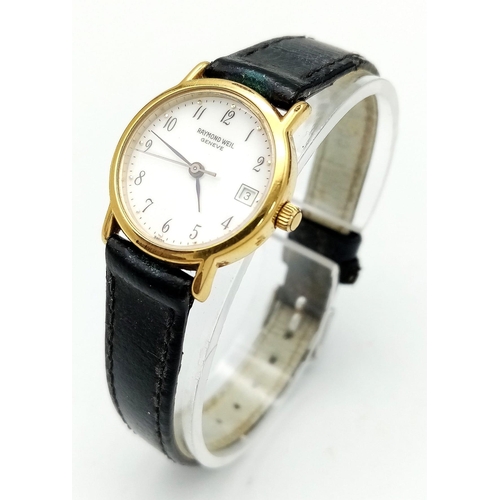 394 - A Vintage Raymond Weil 18K Gold Plated Ladies Watch. Blue leather strap (worn). Gold plated case - 2... 