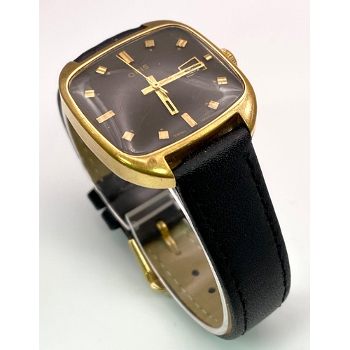 415 - A Vintage 1950s Oris Gents Mechanical Watch. Black leather strap. Gold plated square case - 31mm. Bl... 