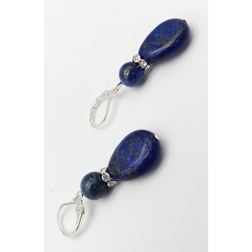 878 - A Pair of Lapis Lazuli Drop Earrings with White Stone Decoration. 3cm drop.