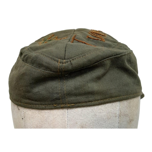 166 - WW2 German Africa Corps M41 Cap. Embroidered by a Prisoner of War.