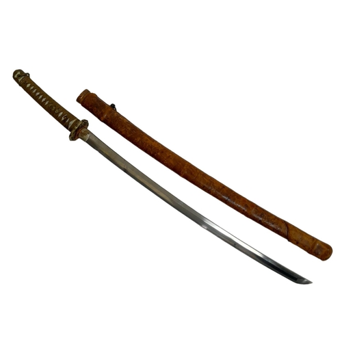 215 - WW2 Japanese Naval Officers Sword. Nice Markings on the Tang. However, slight damage to the blade ed... 