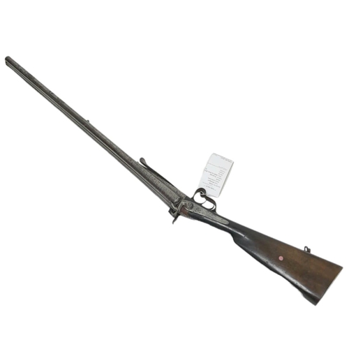 233 - A 16 BORE PIN FIRE ANTIQUE SIDE BY SIDE DOUBLE BARRELED SHOTGUN WITH PATTERNED METALWORK  a/f