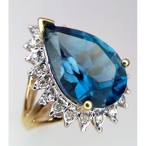 298 - 9kt Yellow Gold Large Pear-Cut, London-Blue, Topaz and Diamond Cluster Ring.
Size: N
Weight: 5.4g
67... 