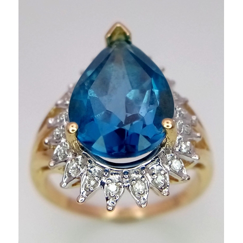 298 - 9kt Yellow Gold Large Pear-Cut, London-Blue, Topaz and Diamond Cluster Ring.
Size: N
Weight: 5.4g
67... 