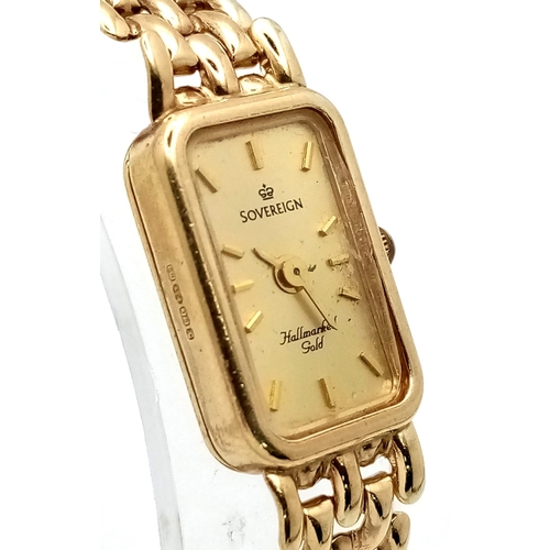 305 - 9kt Yellow Gold Ladies Sovereign Quartz Watch on Bracelet. 
Full working order.
Face: 11.6mm W x 18.... 