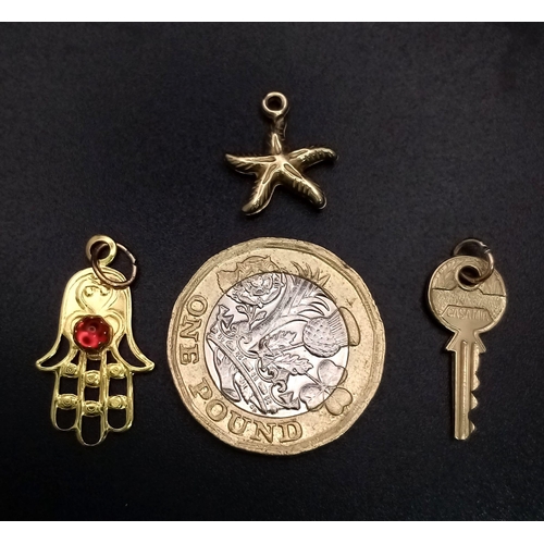 497 - Parcel of 3, 9kt Yellow Gold Charm/Pendants. 
Featuring an Angel (2cm), Key (2cm) and a Starfish (1c... 