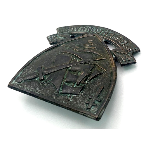 748 - WW2 Free French Commando Cap Badge. Marked “Made in England” on the back.