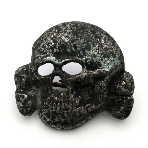 779 - Russian Battlefield Dig up. 3rd Reich Waffen SS Totenkopf (deaths head) Skull Visor Cap Badge.