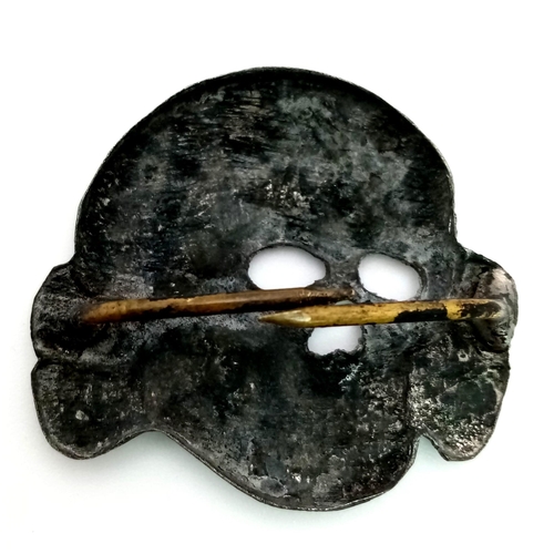 779 - Russian Battlefield Dig up. 3rd Reich Waffen SS Totenkopf (deaths head) Skull Visor Cap Badge.