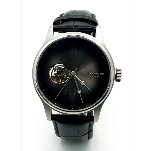 906 - A Thomas Earnshaw '1805' Automatic Gents Watch. Black leather strap. Stainless steel case with skele... 