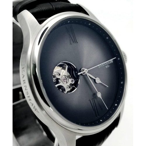 906 - A Thomas Earnshaw '1805' Automatic Gents Watch. Black leather strap. Stainless steel case with skele... 