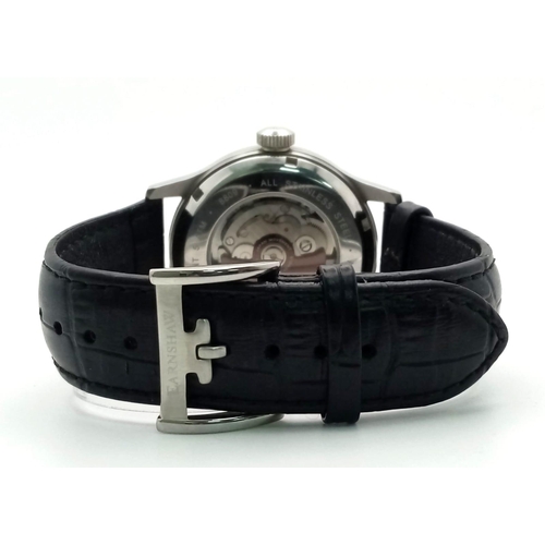 906 - A Thomas Earnshaw '1805' Automatic Gents Watch. Black leather strap. Stainless steel case with skele... 