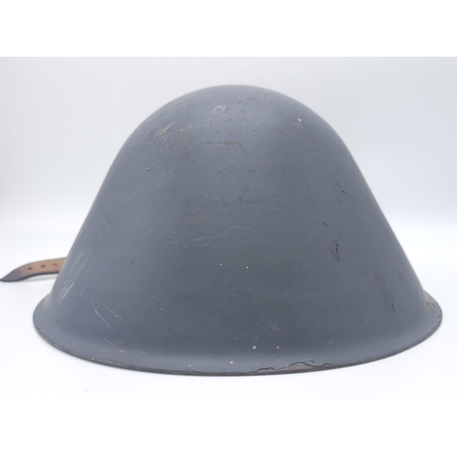 384 - Cold War Period East German D.D.R M56 Helmet with hand painted reunification memorial.