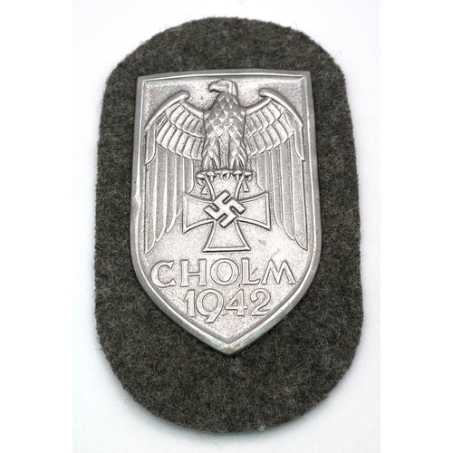 47 - WW2 German Heer (Army) Cholm Campaign Shield in presentation case. Silvered Steel (Magnetic).