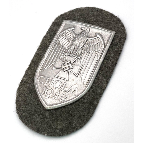 47 - WW2 German Heer (Army) Cholm Campaign Shield in presentation case. Silvered Steel (Magnetic).