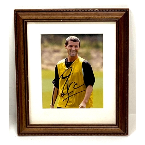 526 - A Football Fans Collection.
Featuring a framed, signed photo of Roy Keane (23.5cmx25.5cm). A framed,... 