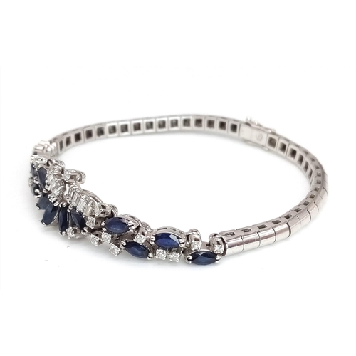 247 - A FABULOUS ART DECO STYLE ARTICULATED BRACELET IN 18K WHITE GOLD WITH DIAMONDS AND SAPPHIRES .  21.5... 