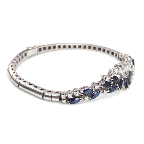 247 - A FABULOUS ART DECO STYLE ARTICULATED BRACELET IN 18K WHITE GOLD WITH DIAMONDS AND SAPPHIRES .  21.5... 