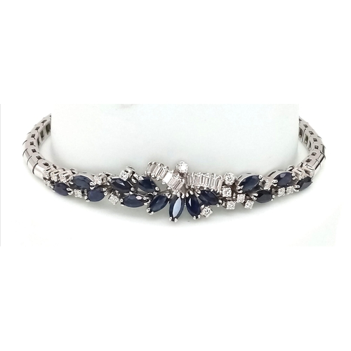 247 - A FABULOUS ART DECO STYLE ARTICULATED BRACELET IN 18K WHITE GOLD WITH DIAMONDS AND SAPPHIRES .  21.5... 