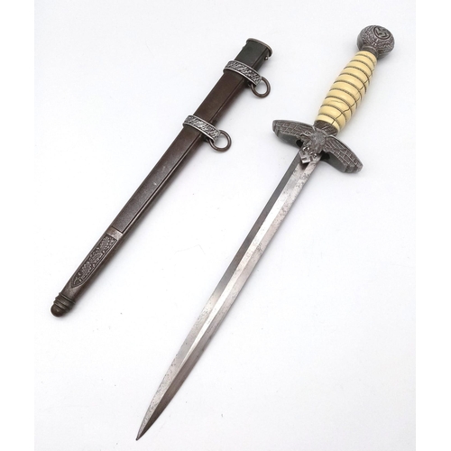 76 - 3rd Reich 2 nd Pattern Luftwaffe Officers Dagger. Produced by wMw Waffen Circa 1937. There is acrack... 