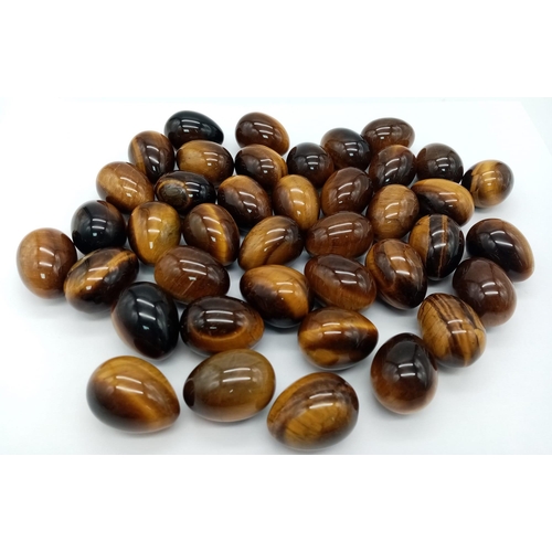 773 - 40 Tigers Eye Egg Shaped Stones.
Each stone is 20g per stone. 
Over 800 grams of this beautiful ston... 