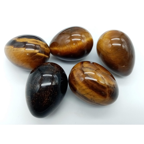 773 - 40 Tigers Eye Egg Shaped Stones.
Each stone is 20g per stone. 
Over 800 grams of this beautiful ston... 