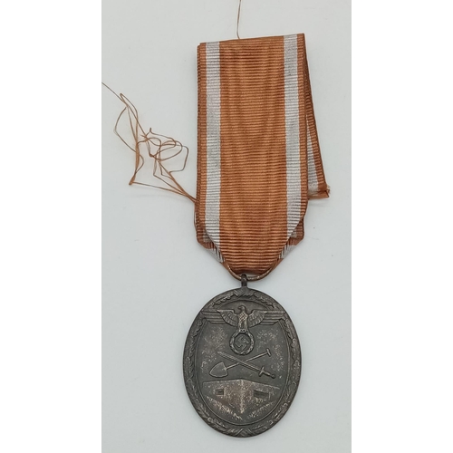 837 - WW2 German West Wall Medal. Awarded to those who built or served on the Seigfried Line.