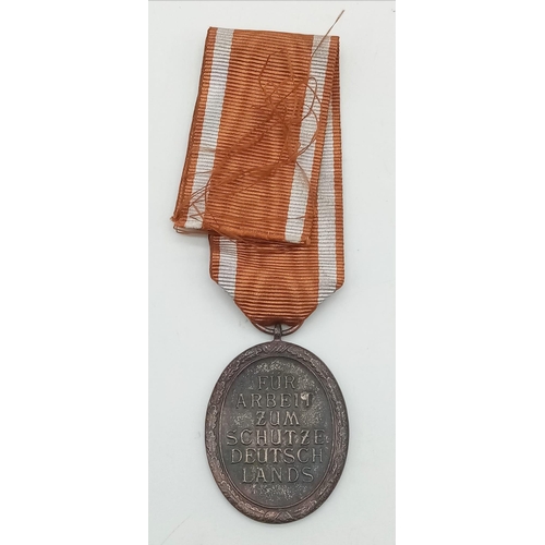 837 - WW2 German West Wall Medal. Awarded to those who built or served on the Seigfried Line.