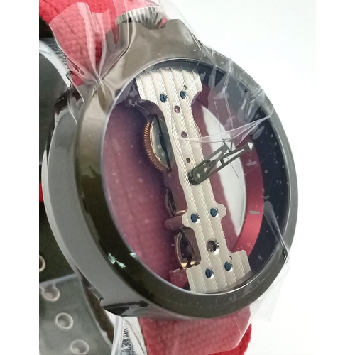 211 - A Gents Verticale Mechanical Skeleton Watch. Red textile strap. Case - 42mm. Top winder. In excellen... 