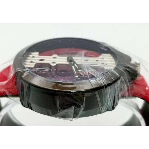 211 - A Gents Verticale Mechanical Skeleton Watch. Red textile strap. Case - 42mm. Top winder. In excellen... 