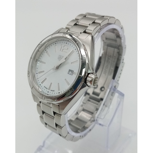 270 - A Tag Heuer Formula 1 Ladies Quartz Watch. Stainless steel bracelet and case - 33mm. Mother of pearl... 