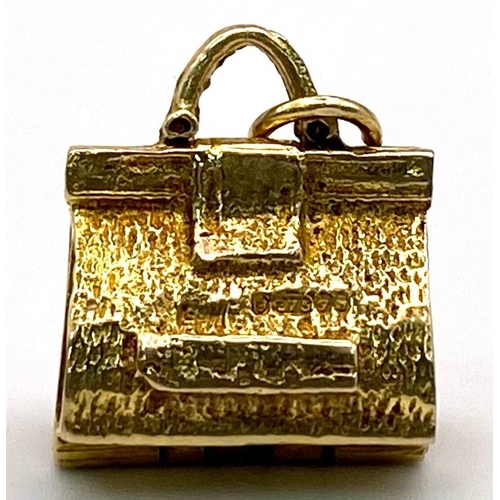 362 - 9K Yellow Gold Midwife's Bag Charm/Pendant.
Opens to reveal a baby inside.
Weight: 4.8g
SC-3050