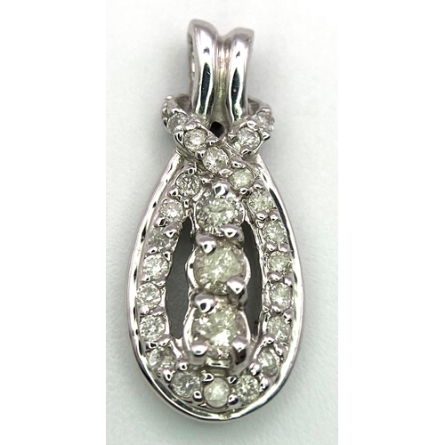 411 - A 14K White Gold Diamond Drop Pendant. 19mm length. 0.37ctw, 1.4g total weight.